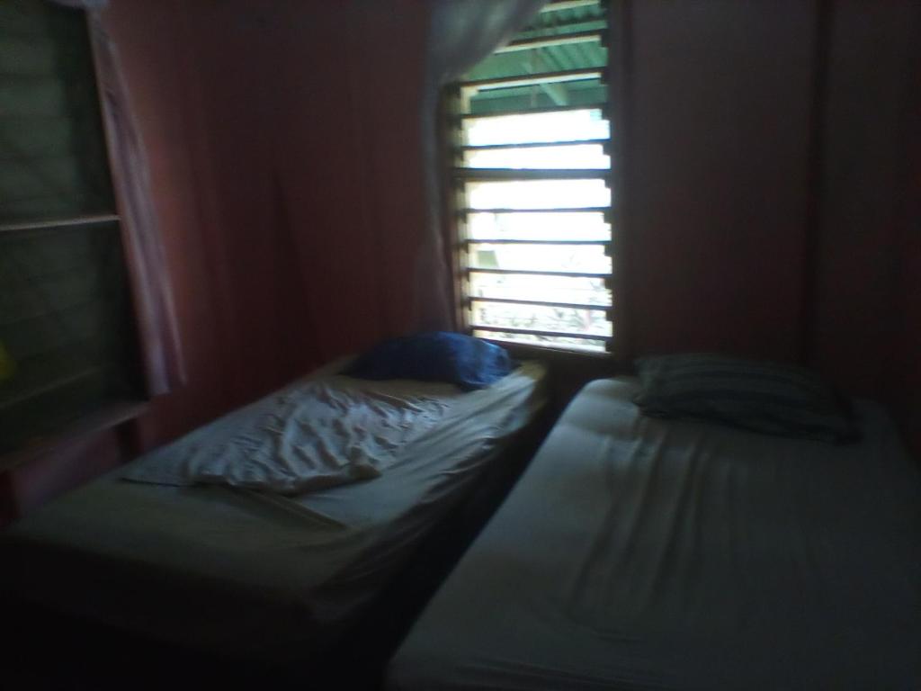 Postel nebo postele na pokoji v ubytování Hotel LomaVista