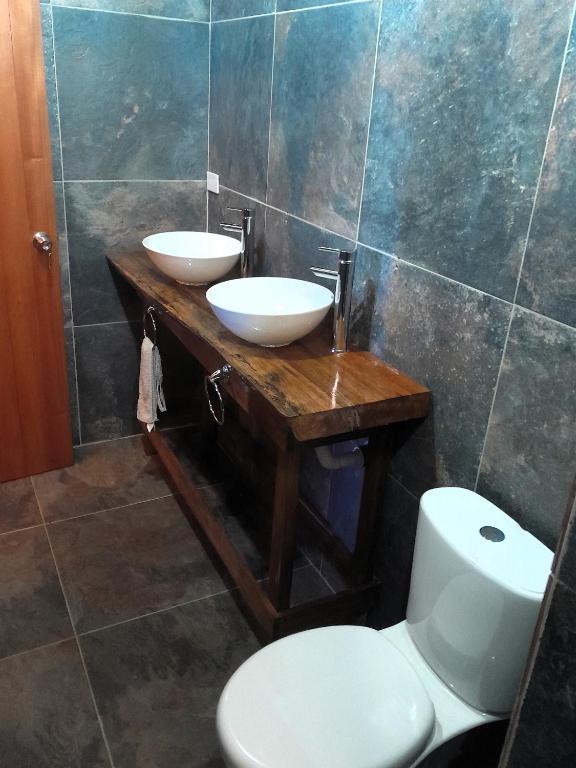 Koupelna v ubytování Mano Verde Minca