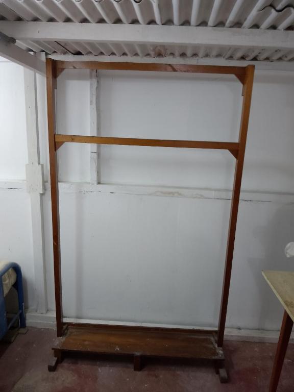 Palanda nebo palandy na pokoji v ubytování Hospedaje cuarto doble