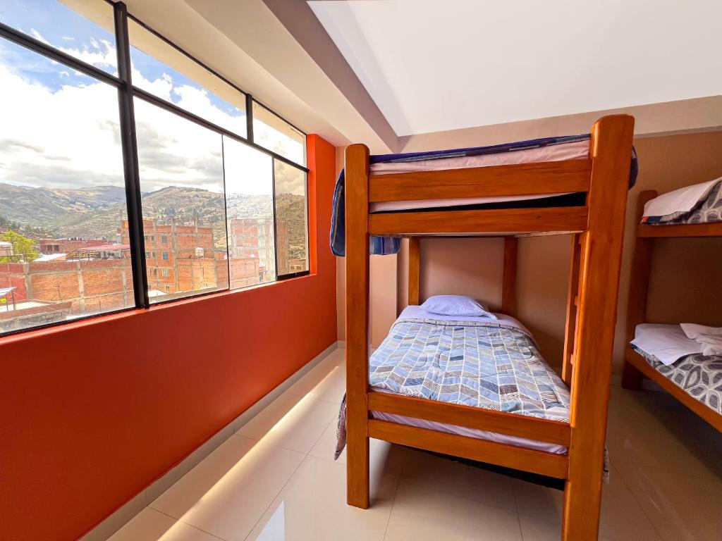 Postel nebo postele na pokoji v ubytování Tony Montaña B&B