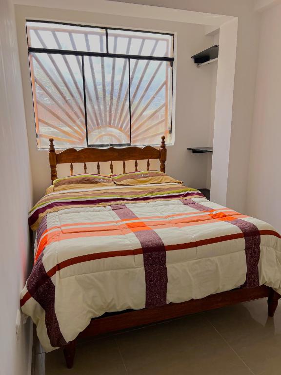 Postel nebo postele na pokoji v ubytování Tony Montaña B&B