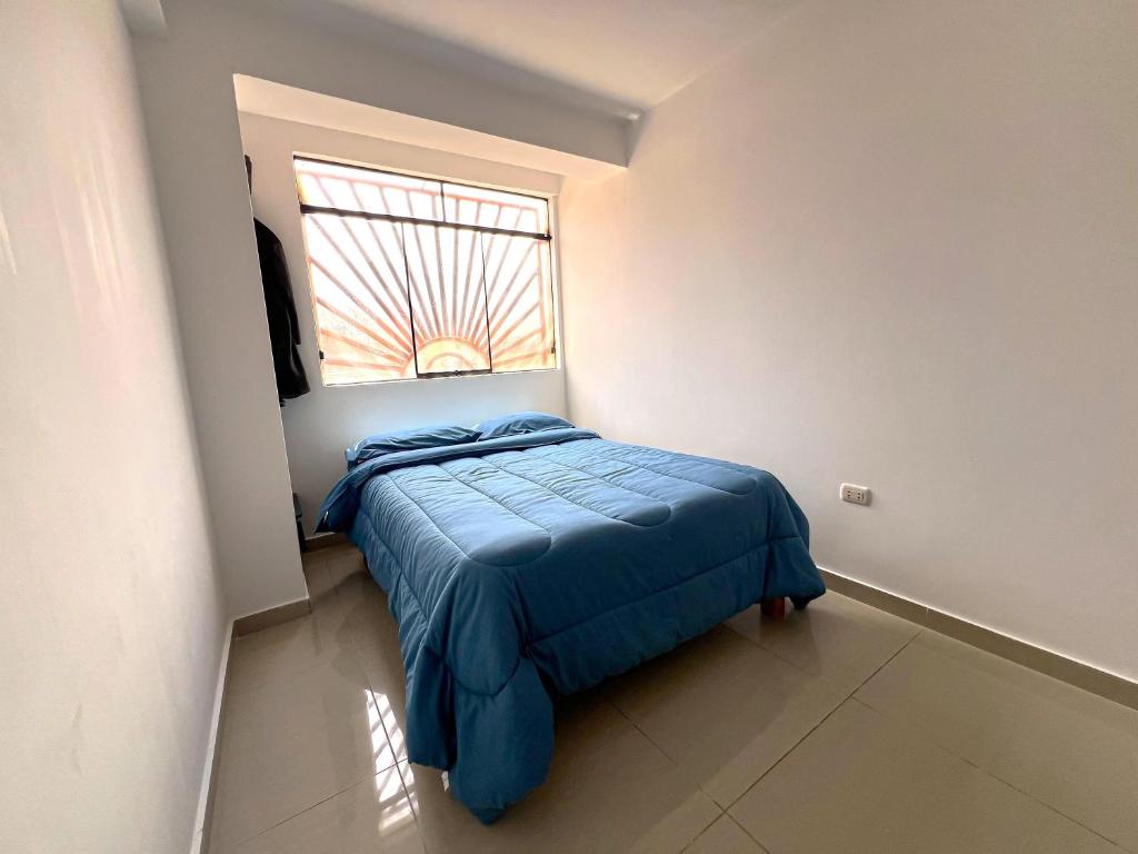 Postel nebo postele na pokoji v ubytování Tony Montaña B&B
