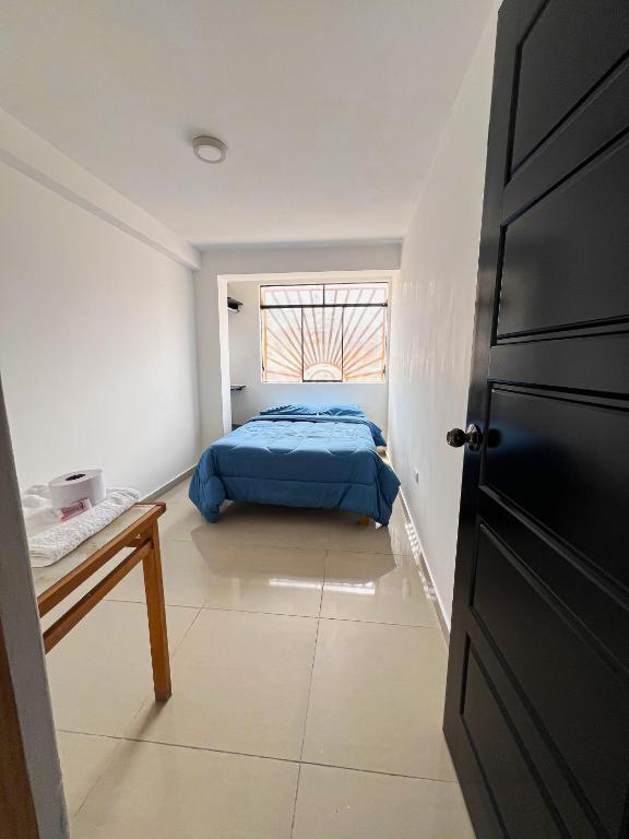 Postel nebo postele na pokoji v ubytování Tony Montaña B&B