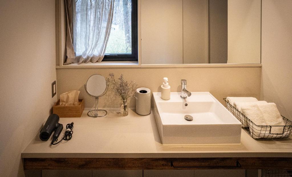 Fotografie z fotogalerie ubytování Nold forest house 那須高原の森の中で心地よく暮らす宿 v destinaci Nasu
