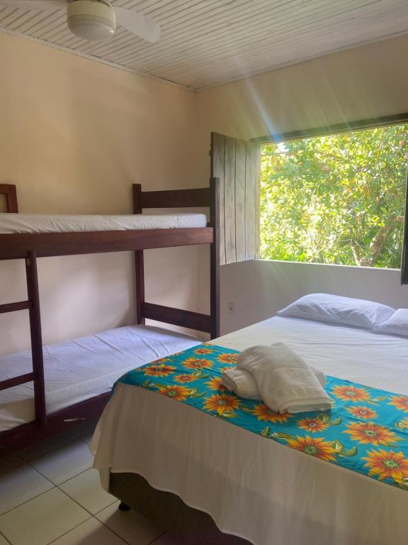 Postel nebo postele na pokoji v ubytování Alecrim Hostel e Pousada