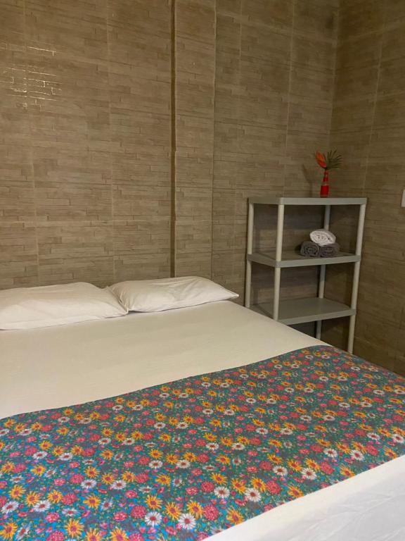 Postel nebo postele na pokoji v ubytování Alecrim Hostel e Pousada