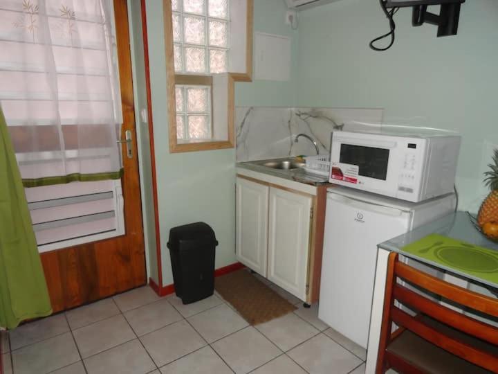 Kuchyň nebo kuchyňský kout v ubytování Smart-lidays'mini-dorm