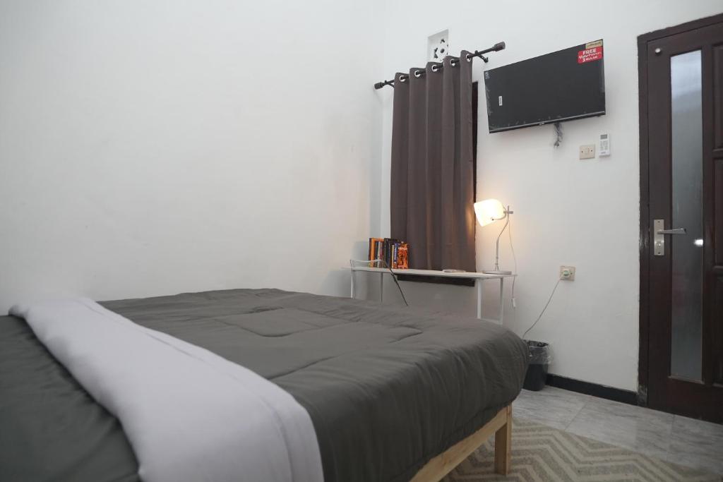 Postel nebo postele na pokoji v ubytování Casa de Vie Homestay