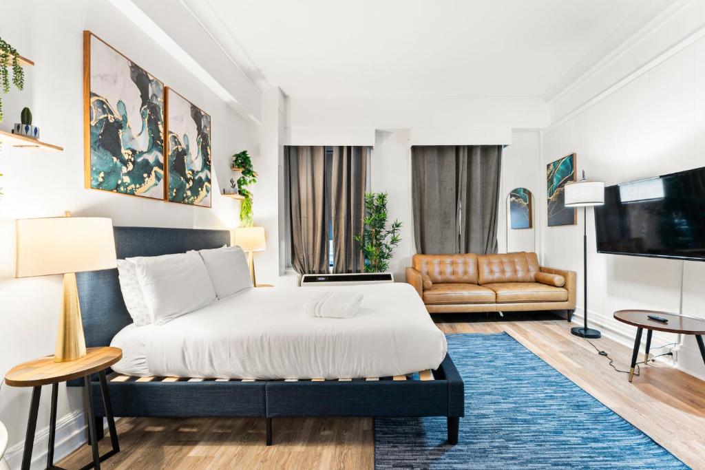 Postelja oz. postelje v sobi nastanitve Furnished Apartment in Downtown