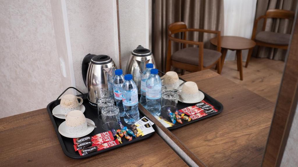 Nápoje v ubytování Consul Hotel