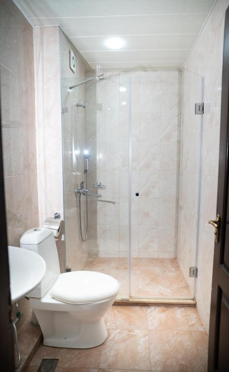 Koupelna v ubytování Consul Hotel