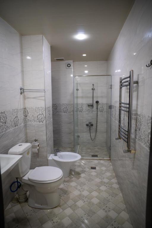 Koupelna v ubytování Consul Hotel