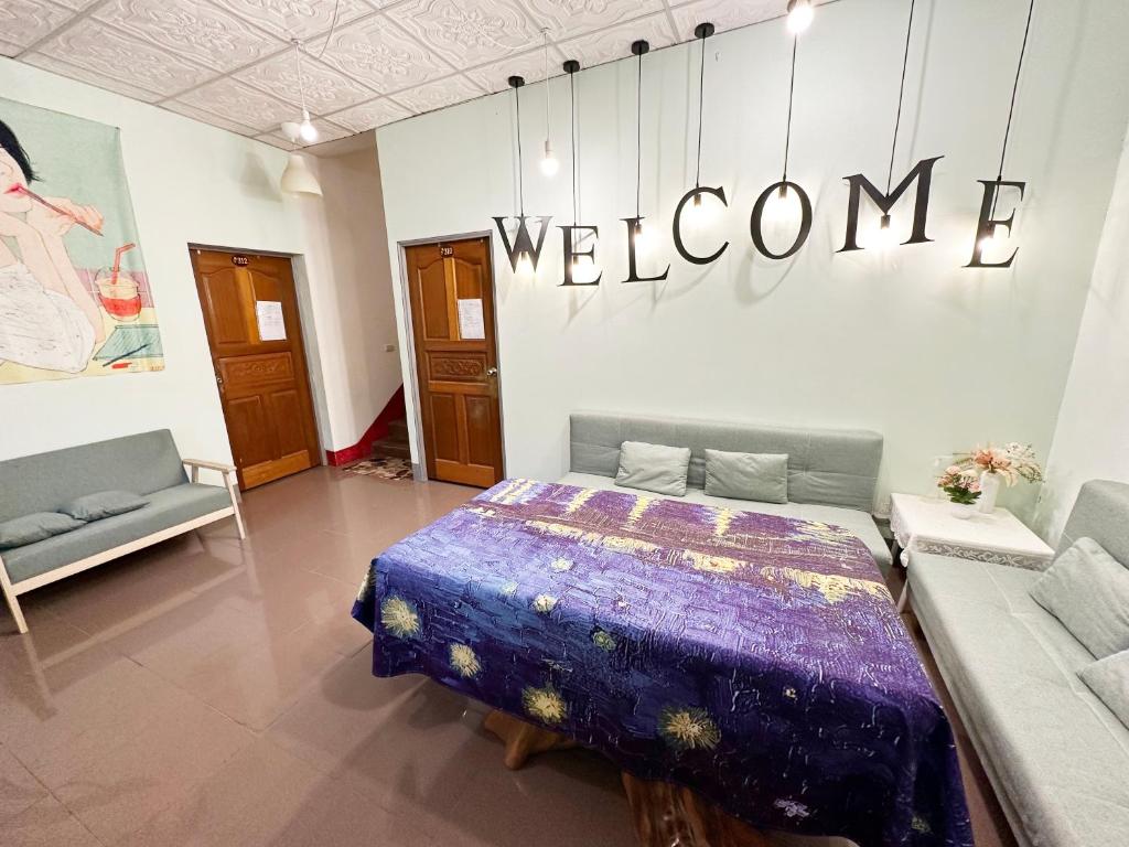 Postel nebo postele na pokoji v ubytování De Wang Villa