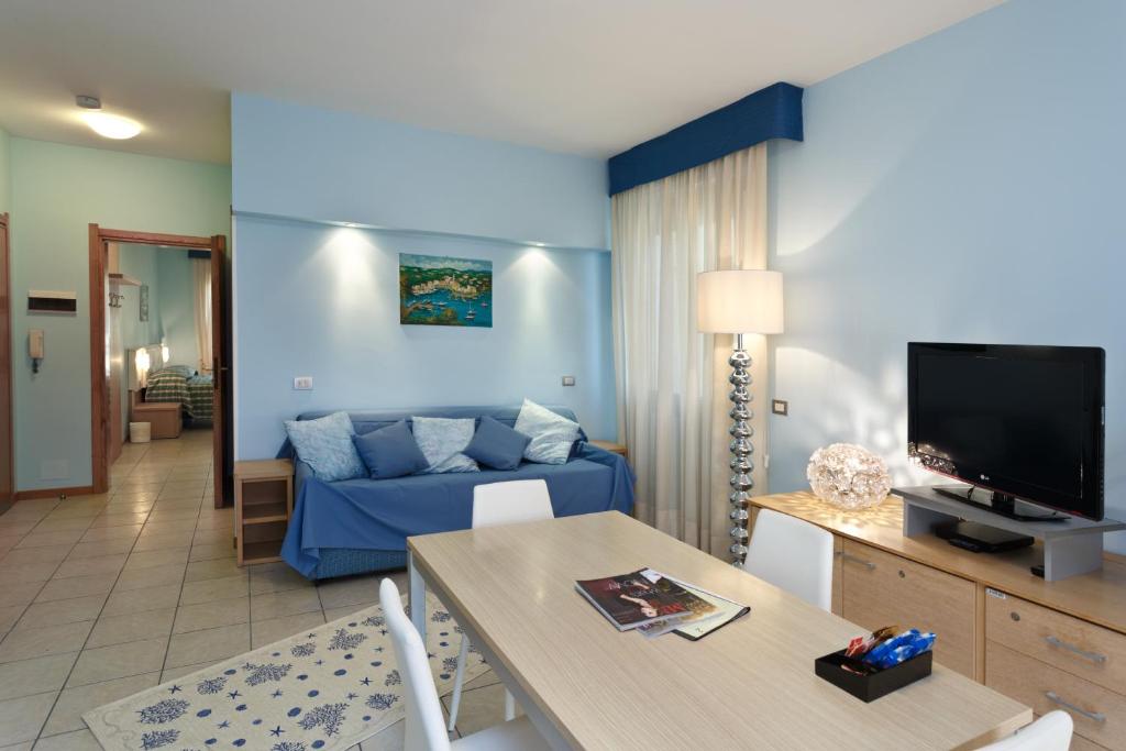 TV a/nebo společenská místnost v ubytování Residence Dei Due Porti