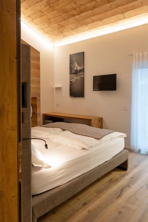 Postel nebo postele na pokoji v ubytování Hotel Zerbion