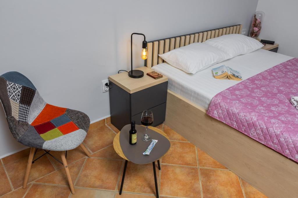 Ліжко або ліжка в номері Adzic Apartments