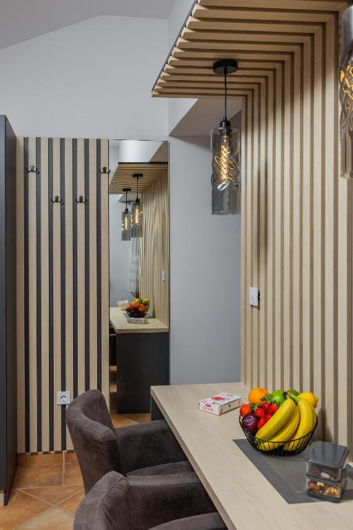 Зона вітальні в Adzic Apartments