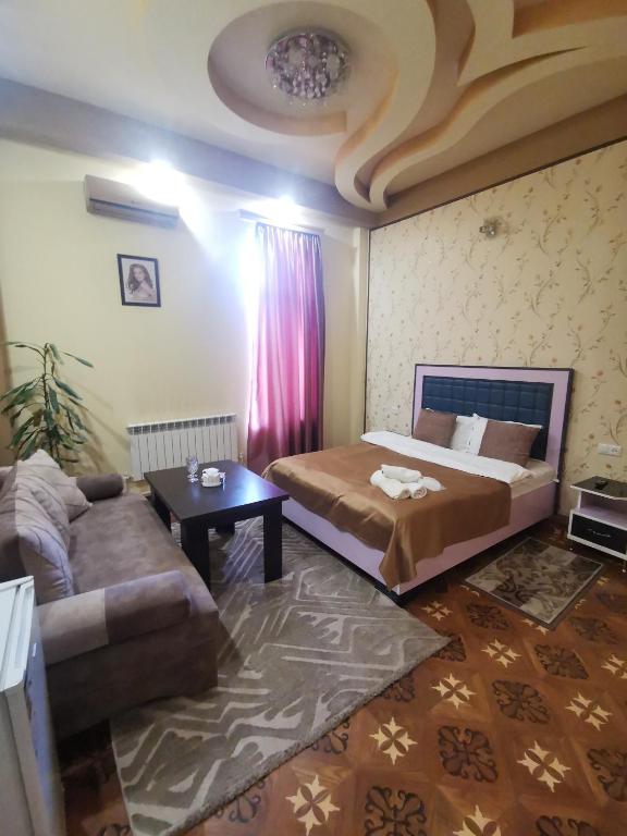 Postel nebo postele na pokoji v ubytování Narek+