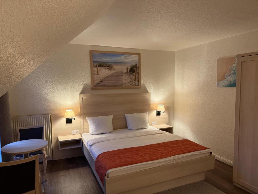 Postel nebo postele na pokoji v ubytování Hotel Up´n Diek
