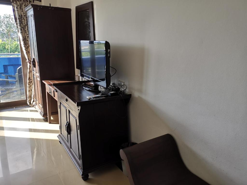 TV a/nebo společenská místnost v ubytování บ้านอันดามัน กระบี่