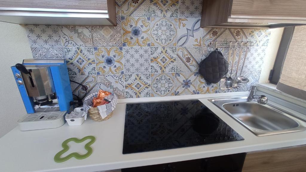 Kuchyň nebo kuchyňský kout v ubytování Casa Anna