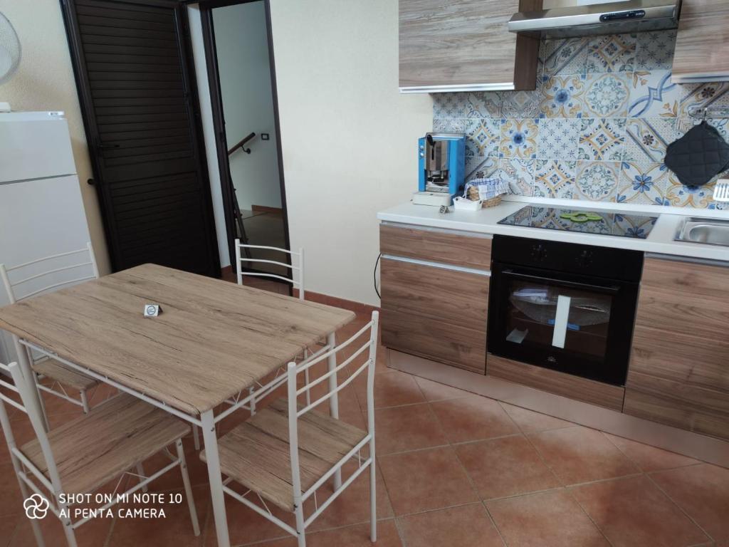 Kuchyň nebo kuchyňský kout v ubytování Casa Anna