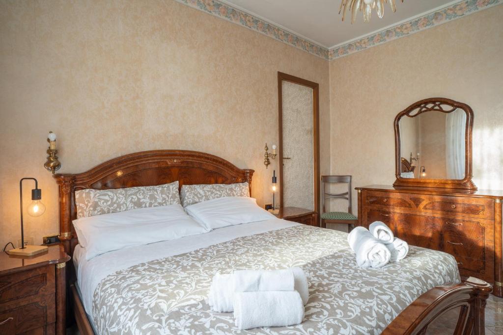 Postel nebo postele na pokoji v ubytování Garden - residence in the center of Barzio
