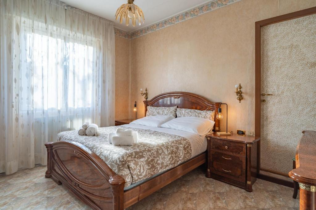 Postel nebo postele na pokoji v ubytování Garden - residence in the center of Barzio
