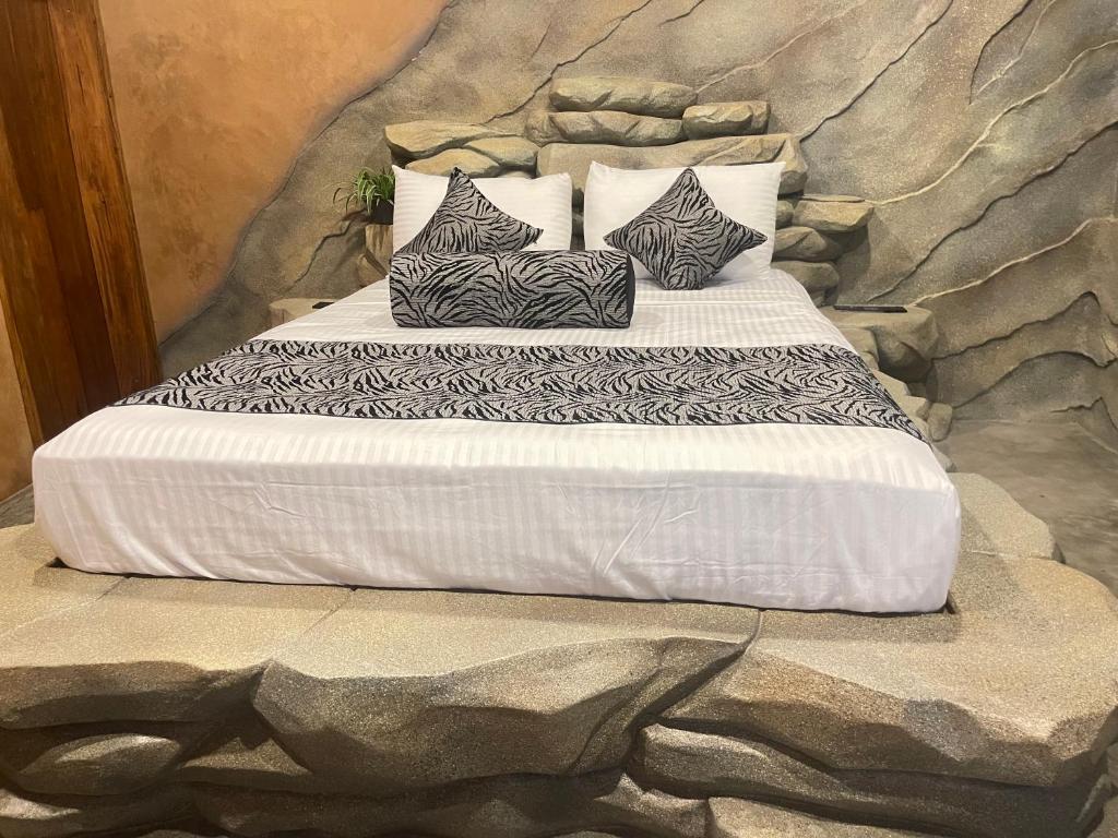 Postel nebo postele na pokoji v ubytování Shan Home Stay Sigiriya