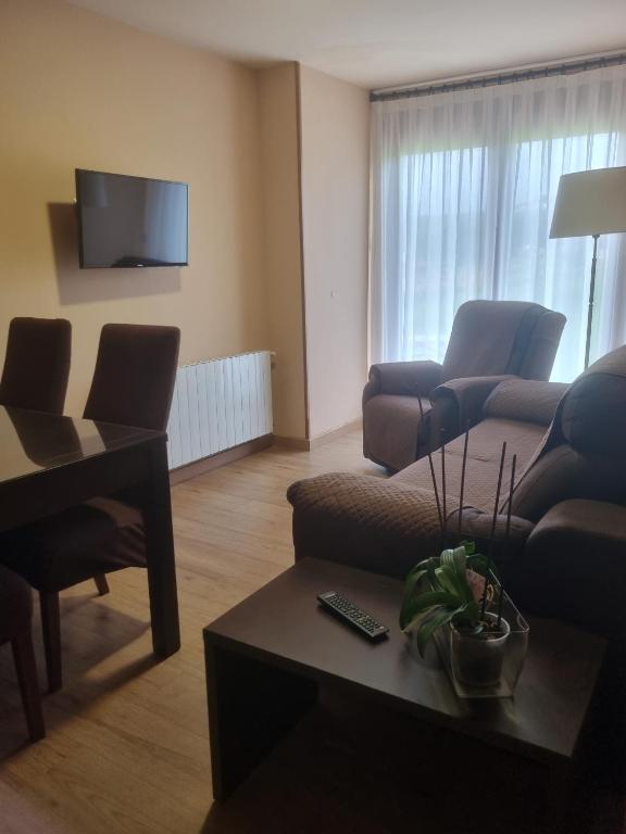 Telewizja i/lub zestaw kina domowego w obiekcie Apartamentos Villa Sofía