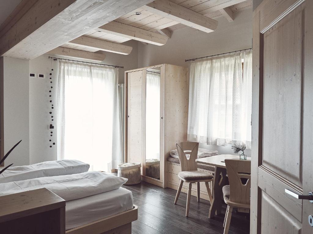 Postel nebo postele na pokoji v ubytování B&B Mia Majon