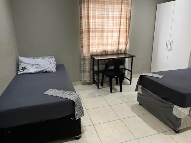 En eller flere senge i et værelse på Oakdale-Bellville Backpackers