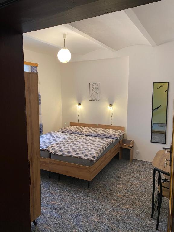 Postel nebo postele na pokoji v ubytování Kotrba privat