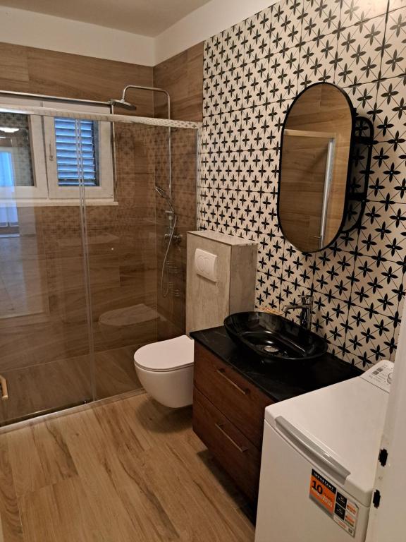 Kúpeľňa v ubytovaní Apartment Artemisia 1