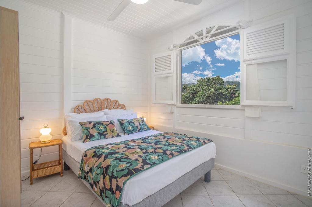 Letto o letti in una camera di Villa M'Bay