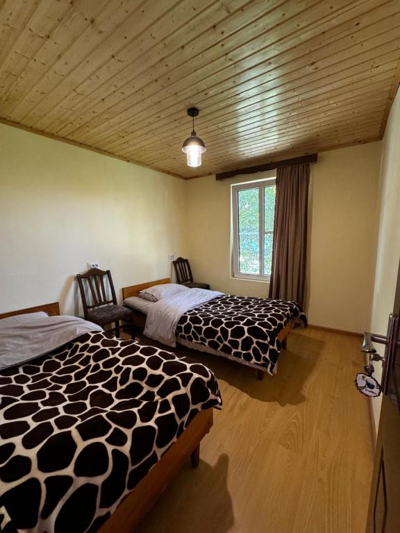 Postel nebo postele na pokoji v ubytování Shorena's Homestay