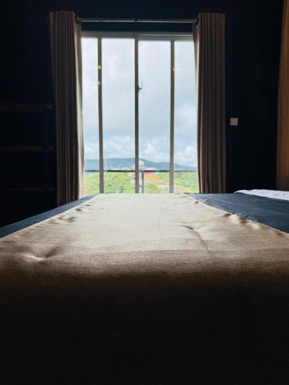 Postel nebo postele na pokoji v ubytování Cloudscape Breeze