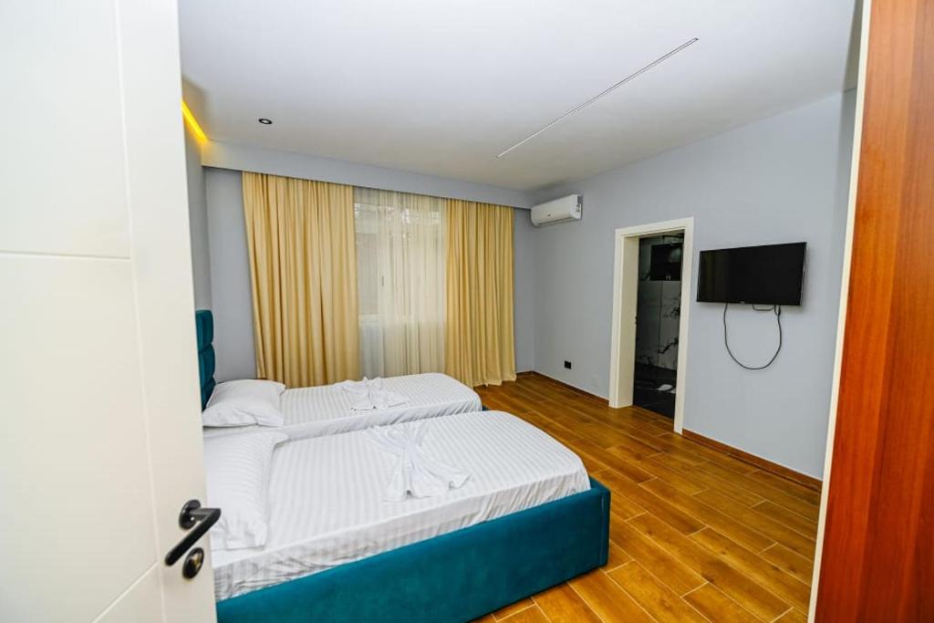 Postel nebo postele na pokoji v ubytování Mon Ami Boutique Hotel