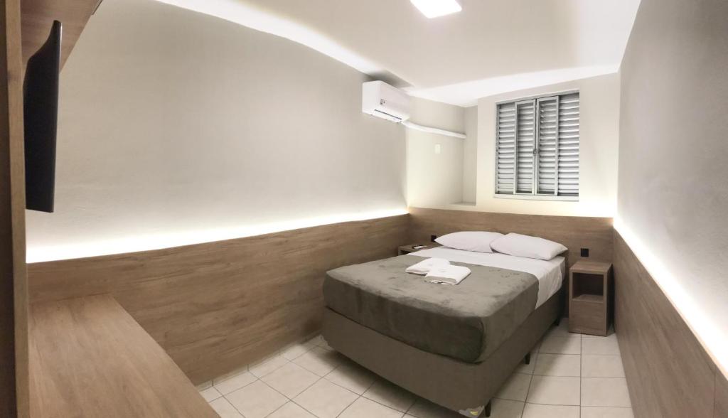 Postel nebo postele na pokoji v ubytování Ipê Hotel Curitiba - Aeroporto