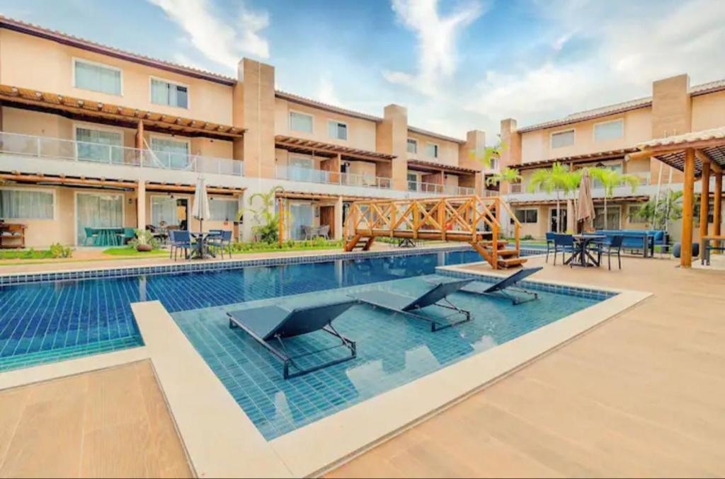 an image of a swimming pool at a hotel at Casa Itacimitim Praia do Surf in Camacari