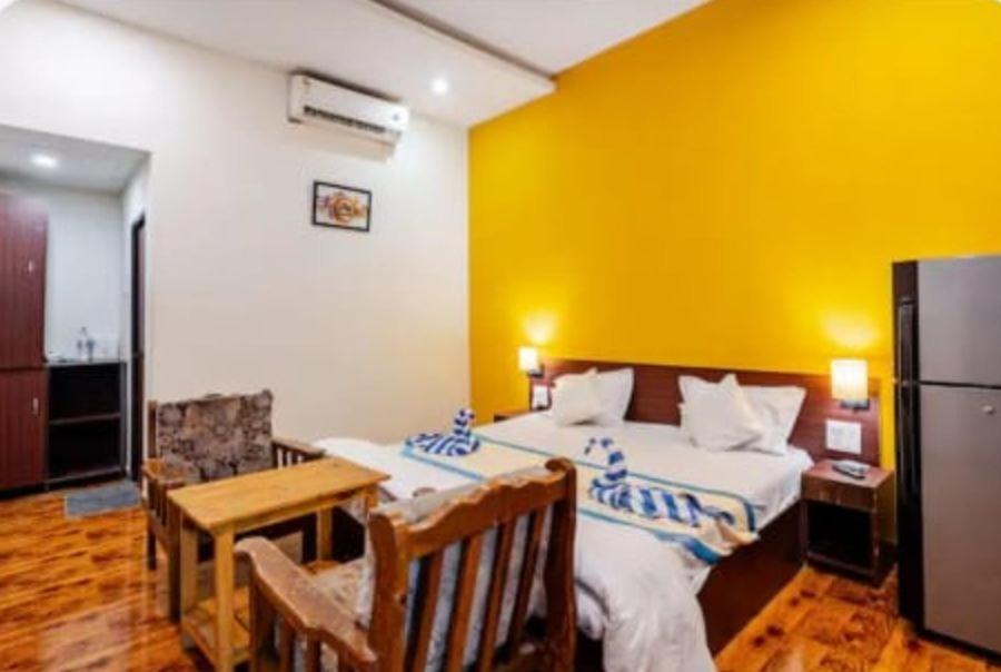 Postel nebo postele na pokoji v ubytování Royalstar Resort
