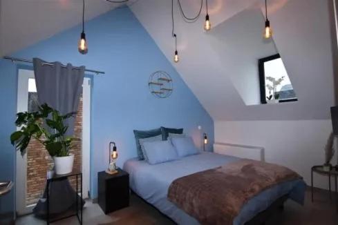 Postel nebo postele na pokoji v ubytování B & B 't Pomphuys