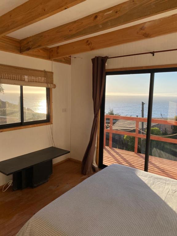 Postel nebo postele na pokoji v ubytování Cabañas Cerro Tacna
