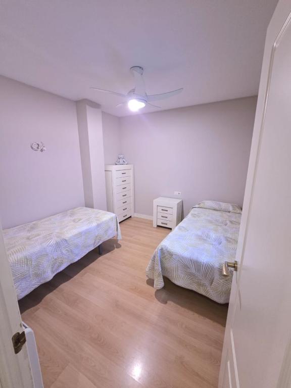 Postel nebo postele na pokoji v ubytování Plaza Apartment Parking Free