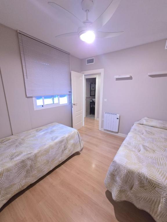 Postel nebo postele na pokoji v ubytování Plaza Apartment Parking Free