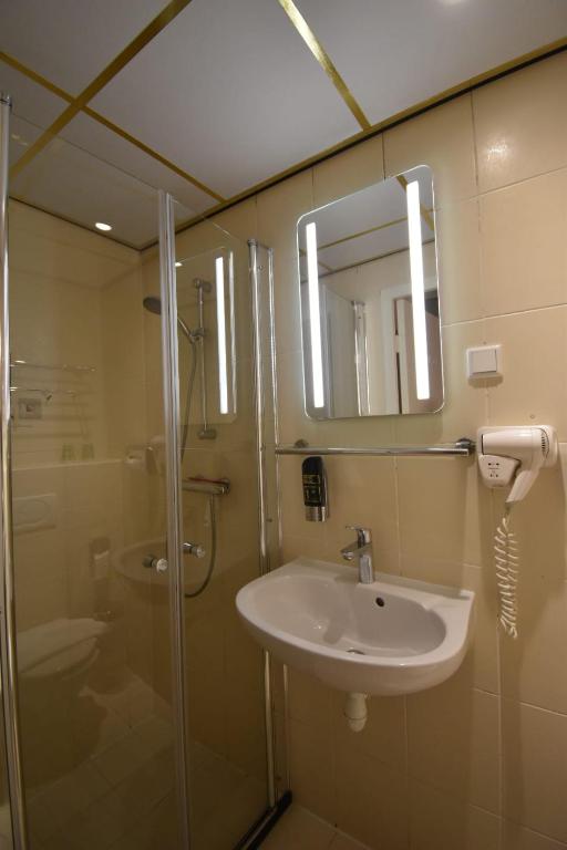 Koupelna v ubytování ITC Hotel