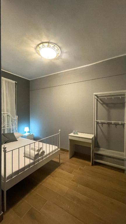 Postel nebo postele na pokoji v ubytování Bella Mare Suites - Formia