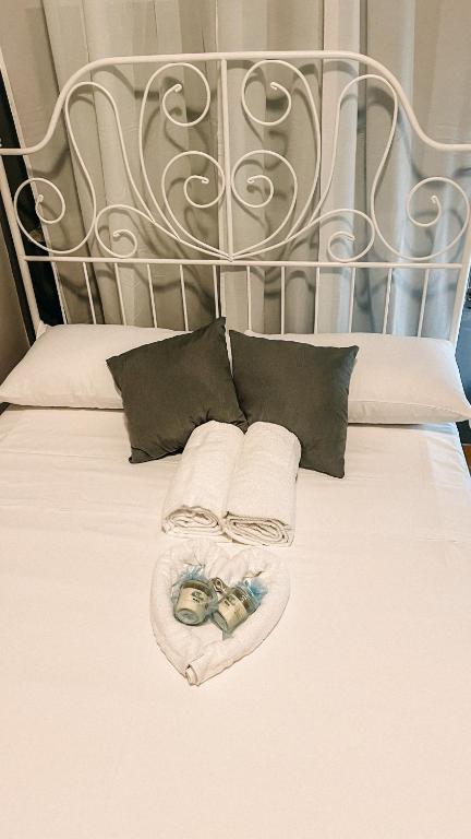 Postel nebo postele na pokoji v ubytování Bella Mare Suites - Formia