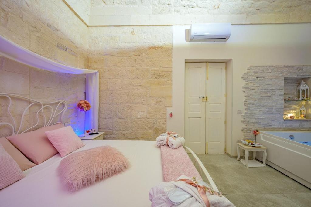 Posteľ alebo postele v izbe v ubytovaní Casa Deky