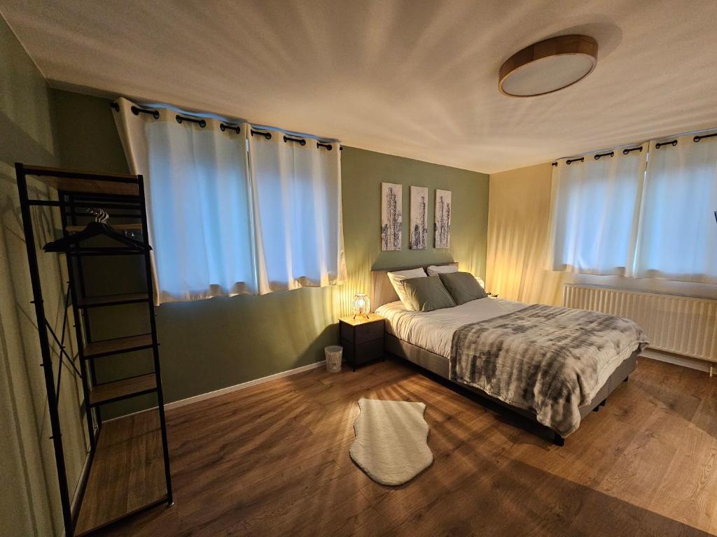 Postel nebo postele na pokoji v ubytování Villa De Miguel